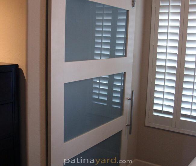 frosted glass panels in a shaker style wood frame