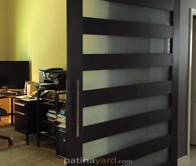 contemporary wood and satin frosted glass barn door