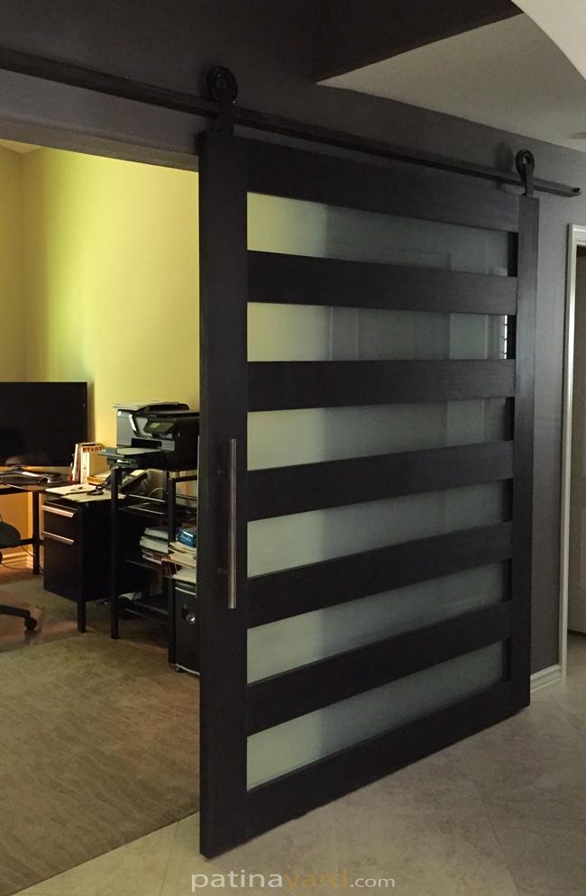 contemporary wood and satin frosted glass barn door