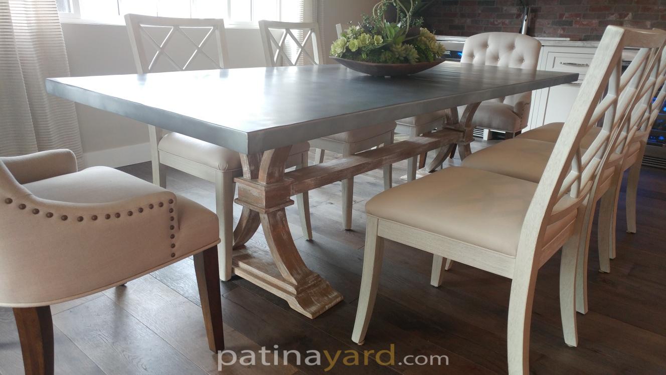 zinc table top with trestle wood legs