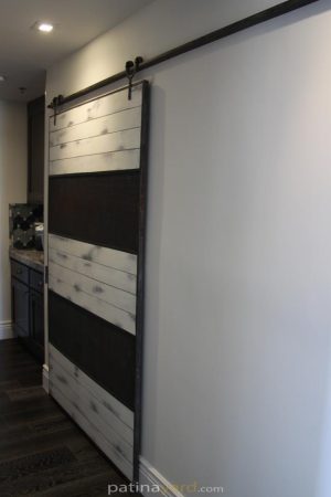 Industrial Weathered wood and metal barn door ranch style barn door with wire mesh and white weathered paint