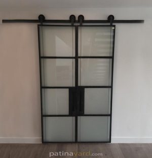 blacken steel and satin glass barn door