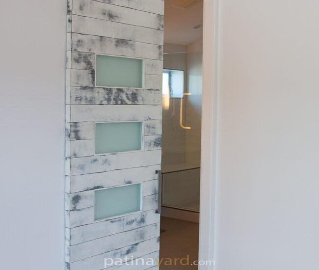 weathered white barn doors with satin glass