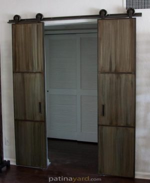 Double Patina Metal Barn Doors double warehouse style barn door with patina metal