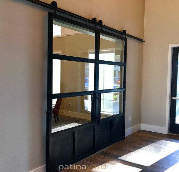 double patina steel and glass barn doors