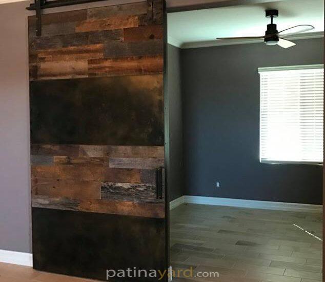 patina metal and reclaimed barn wood barn door