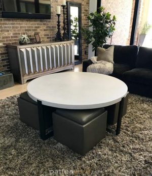 x metal base with round white concrete top