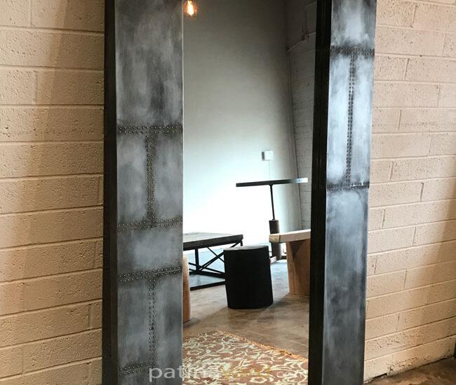 zinc and rivet wall mirror