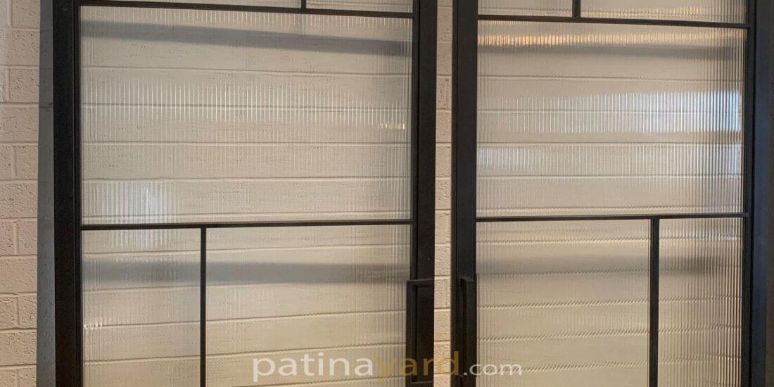contemporary industrial frames with reeded glass panels