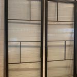 Reeded Glass and Steel Patina-ed Doors