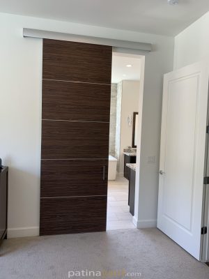Bella laminate oak door with stainless seams