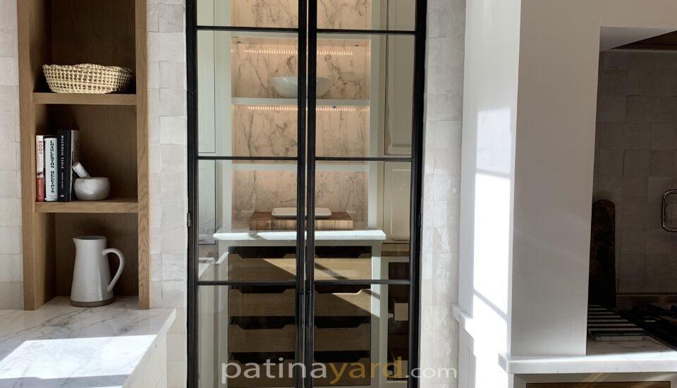 hinged double metal and glass doors