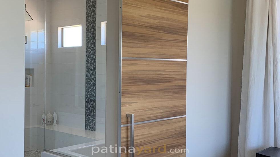 modern barn door with stainless hardware