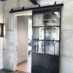 Antique Mirror and Metal Sliding Door with Brass Details
