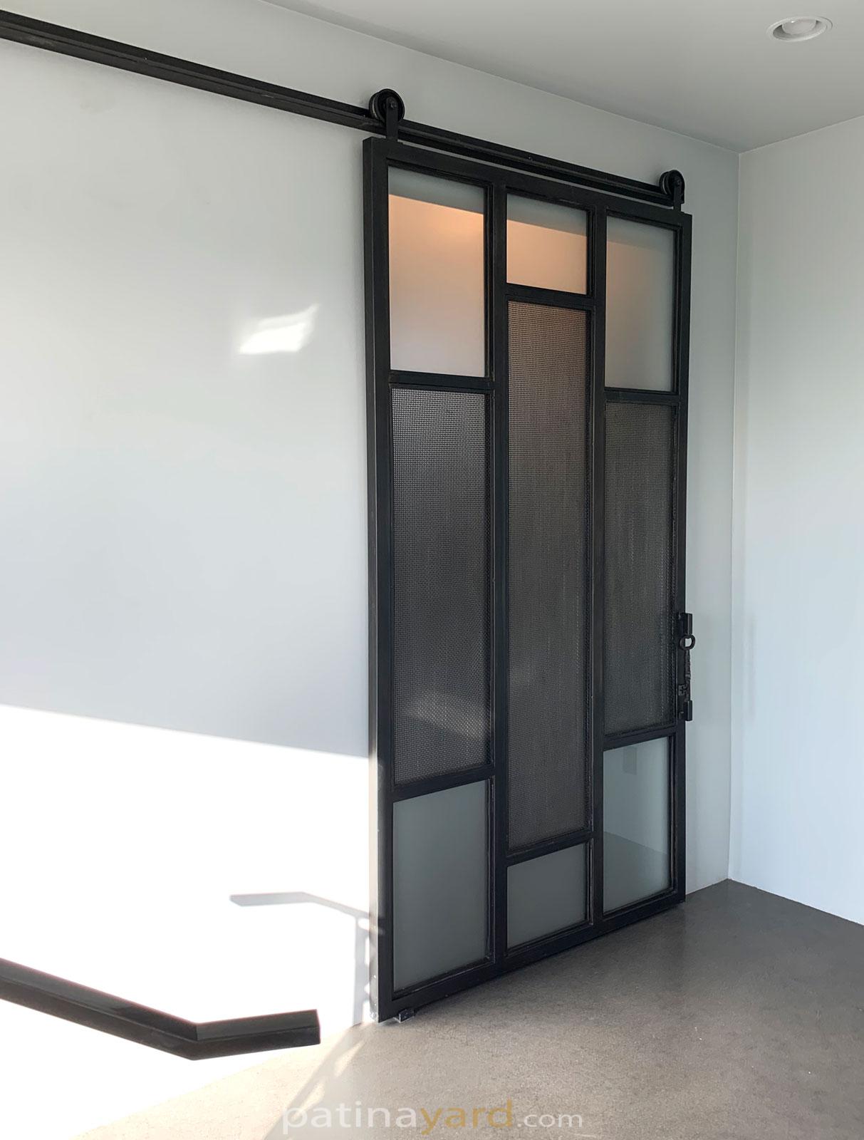 metal barn door with satin glass and wire mesh