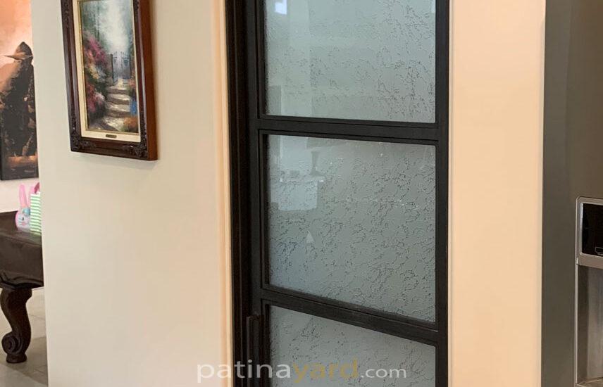 metal and textured glass pantry door