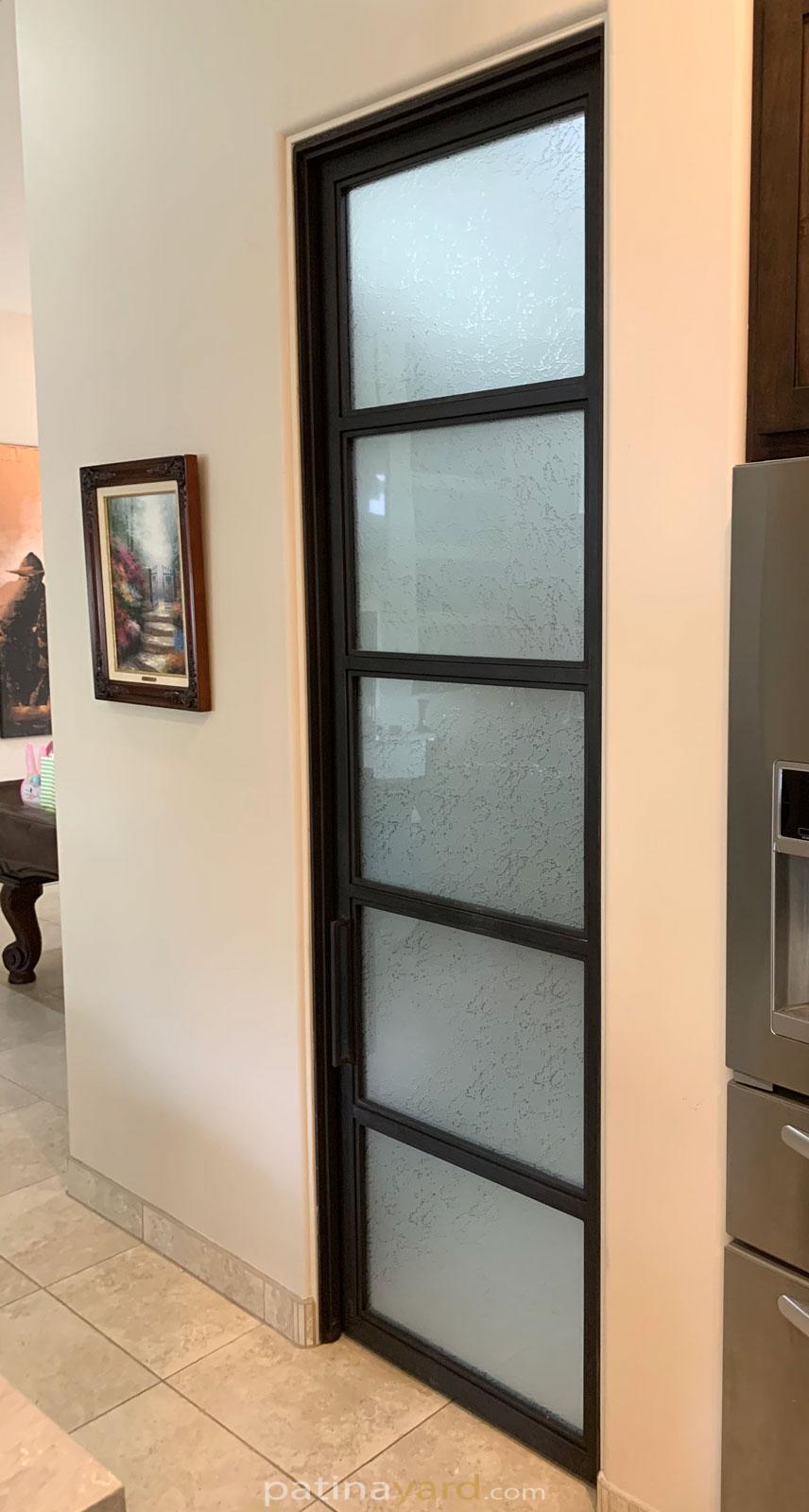 metal and textured glass pantry door