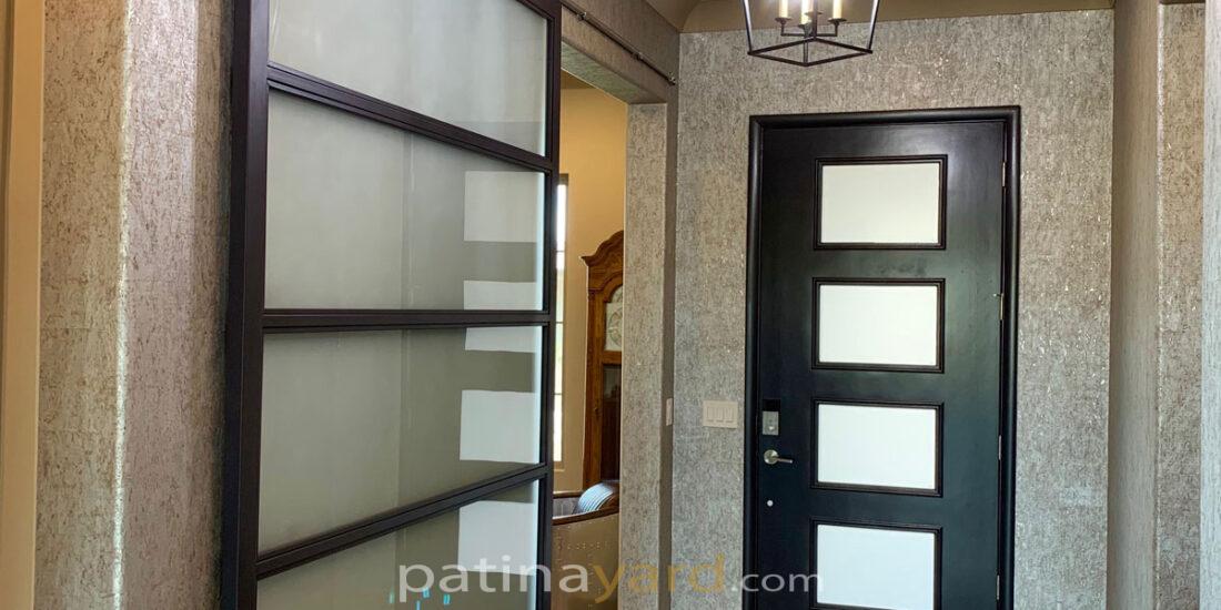 satin glass and metal barn door with stainless steel hardware
