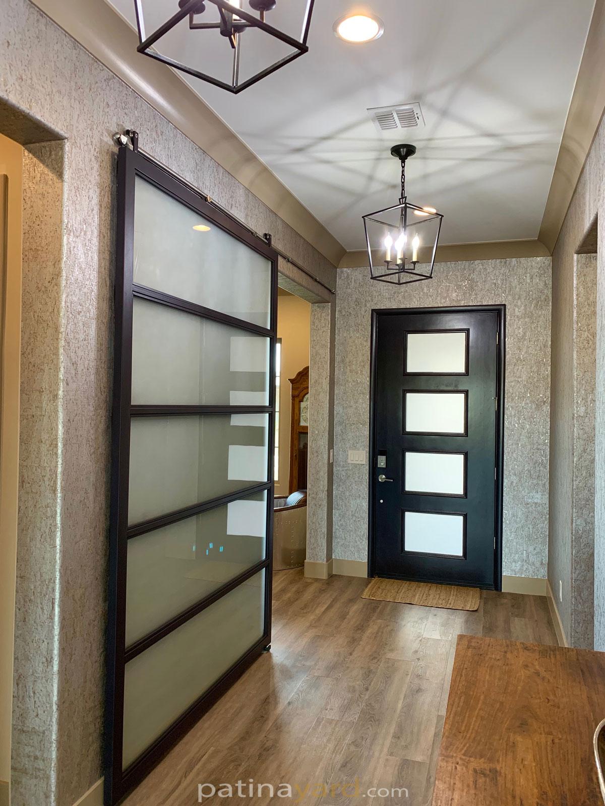satin glass and metal barn door with stainless steel hardware