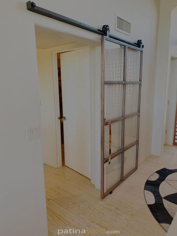 custom copper barn door and glass