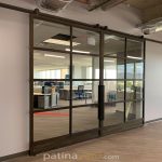 Custom Metal and Clear Glass Sliding Barn Doors