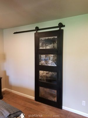 Charred wood antique mirror barn doors