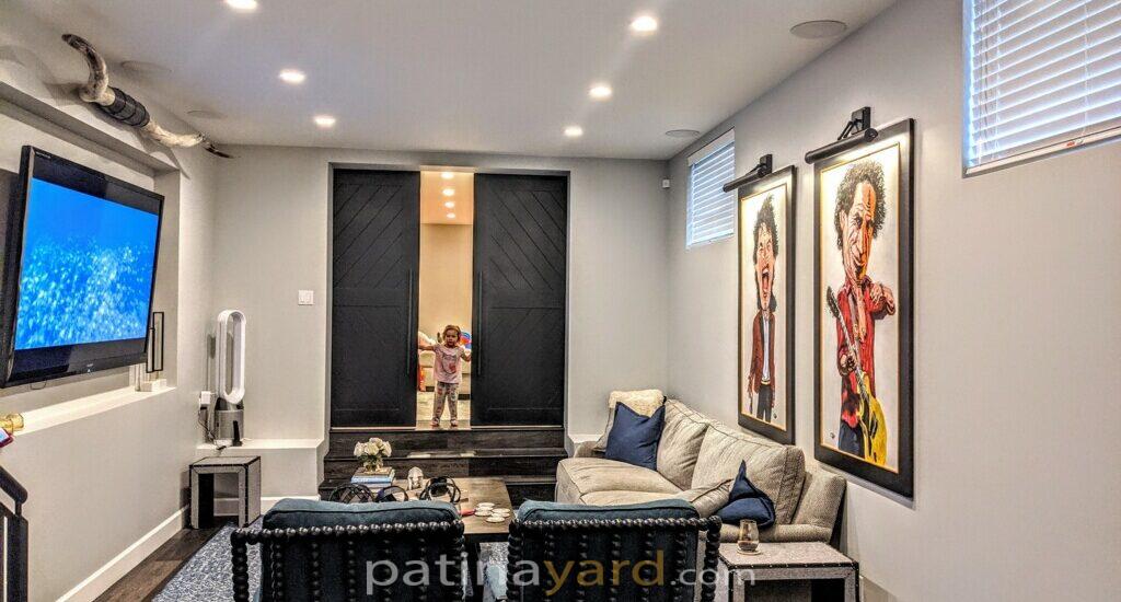 theater room double wood barn doors