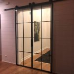 Contemporary Industrial Steel and Clear Glass Barn Doors