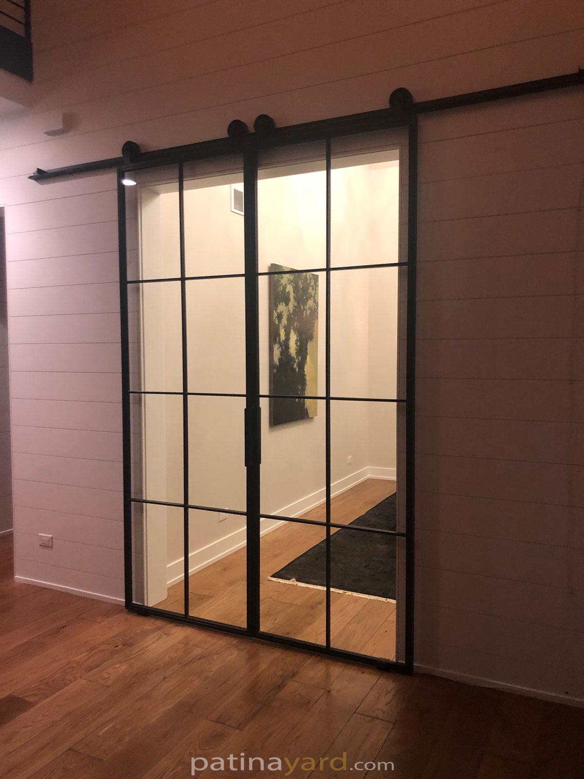 Double steel and clear glass barn doors