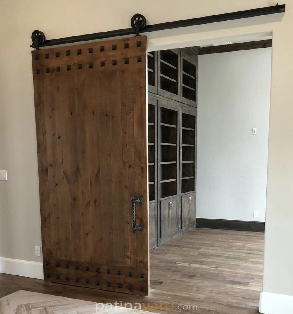 solid wood barn door with clavos