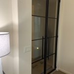 Pair of Hinged Steel and Clear Glass Doors
