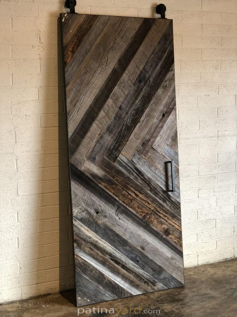 Chevron pattern reclaimed barn wood door