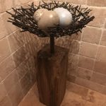 Concrete Stand with Eggs and Metal Nest