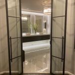Contemporary Style Hinged Metal and Glass Doors