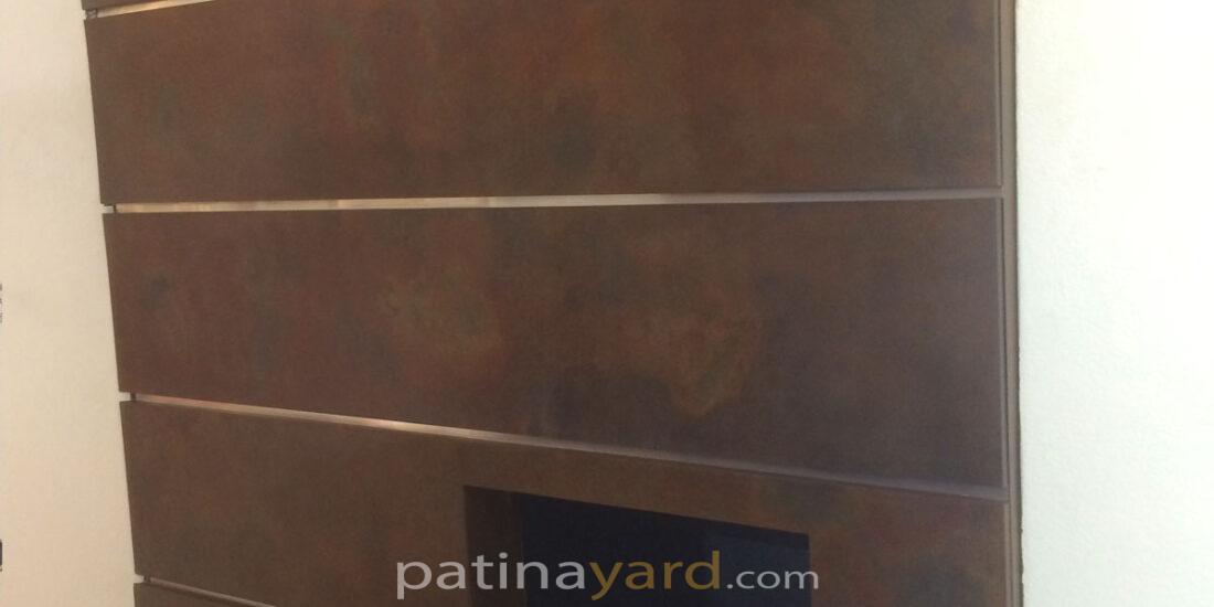 contemporary metal panels patinaed fireplace