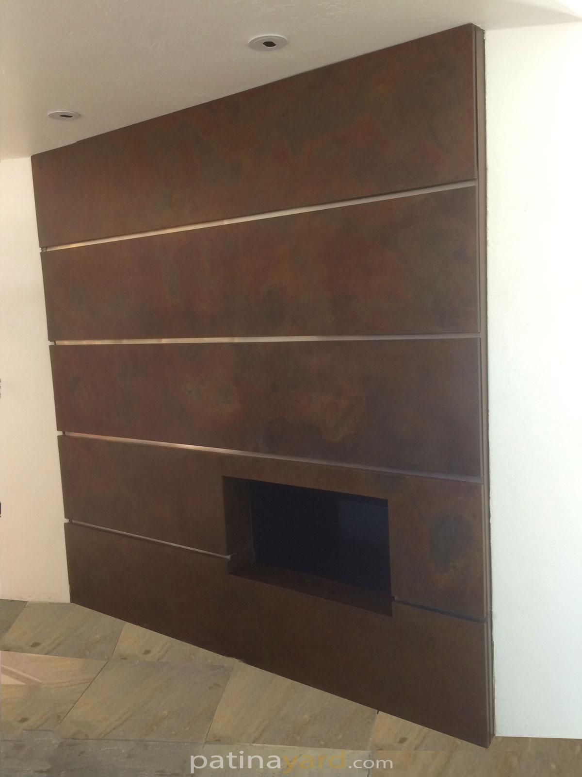 contemporary metal panels patinaed fireplace