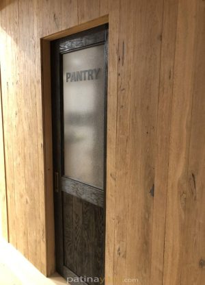 Wood Pantry Closet Pocket Door Stained white oak pantry pocket door with textured glass