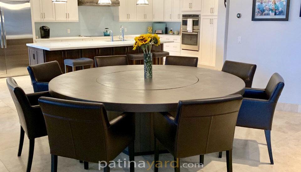 large round table with lazy susan and pedestal base