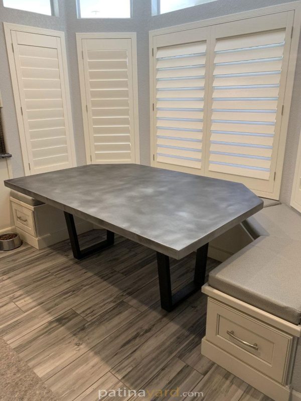zinc table with u shaped metal legs