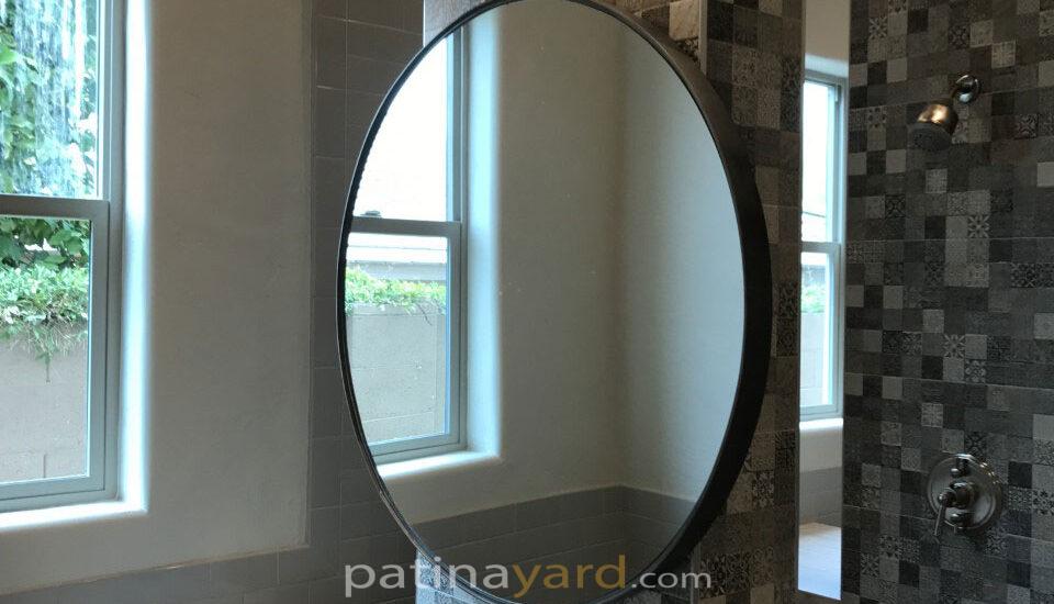 large round metal mirror