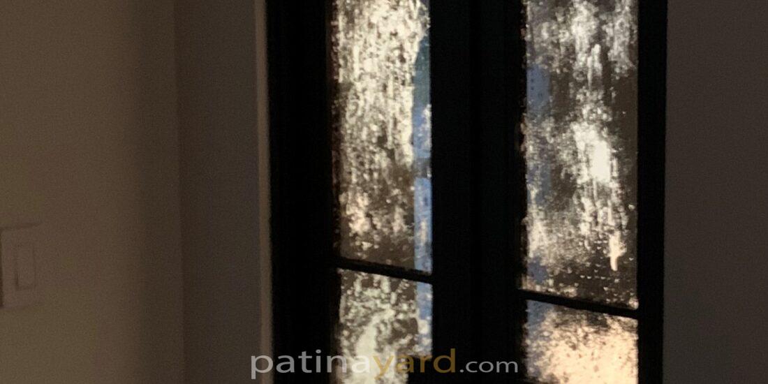 small double doors with antique mirrors