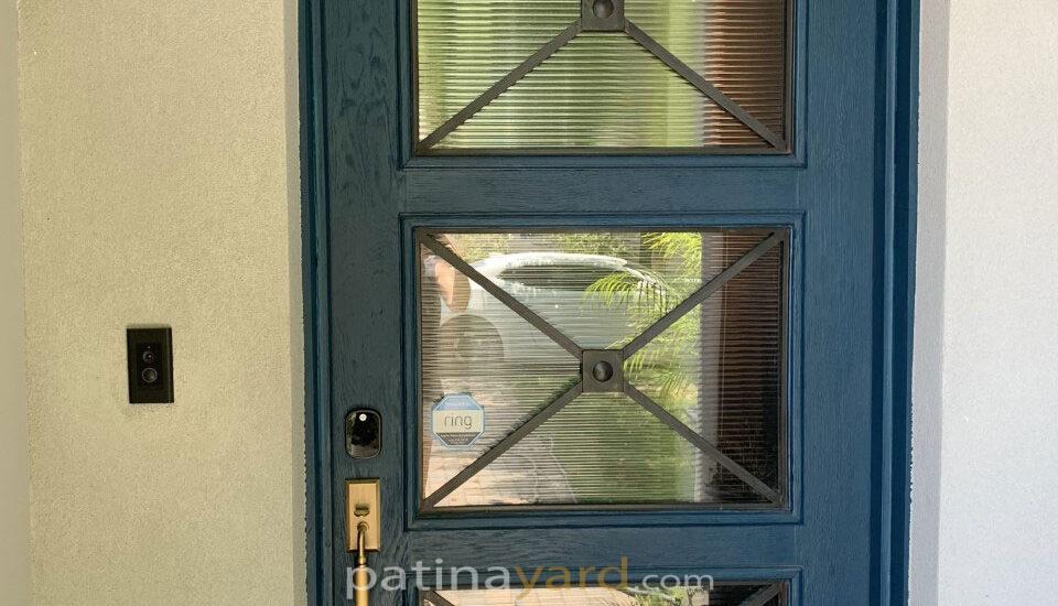 white oak and reeded glass entry door