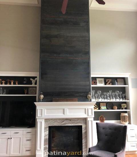 Steel wall facade above fireplace