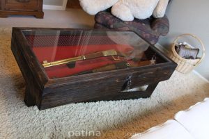 gun encased coffee table