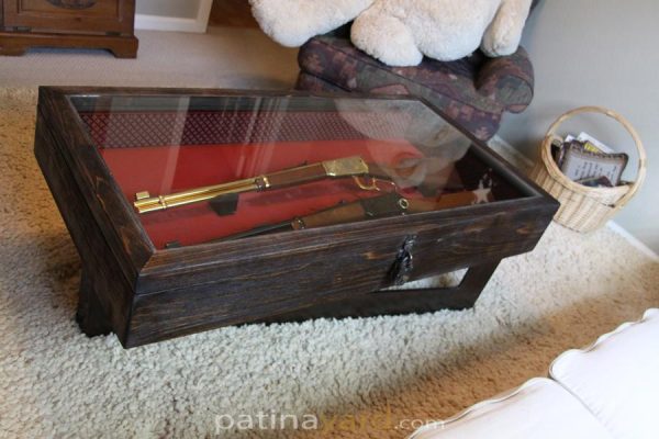 gun encased coffee table