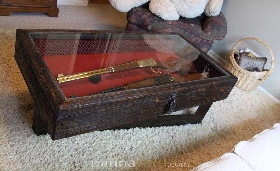 gun encased coffee table
