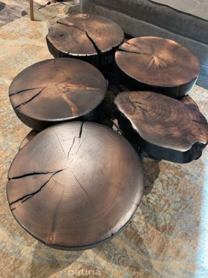 stained and charred log coffee table