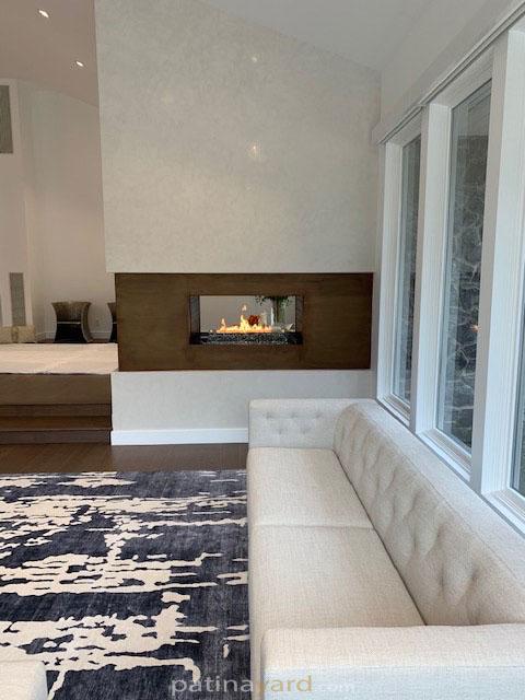 Three wall brown patina metal fireplace surround.