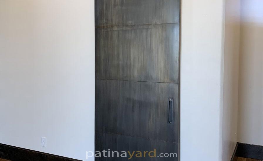 patina metal panel barn door