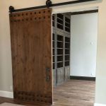 Stained Wood Barn Door With Clavos